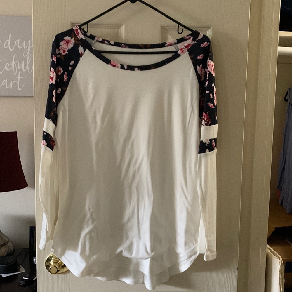 This floral shirt was recent purchase off of Amazon that did not fit. Size Large